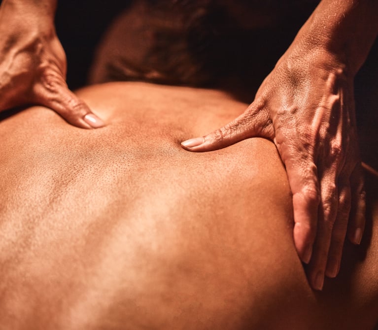 Closeup of an upper back massage.
