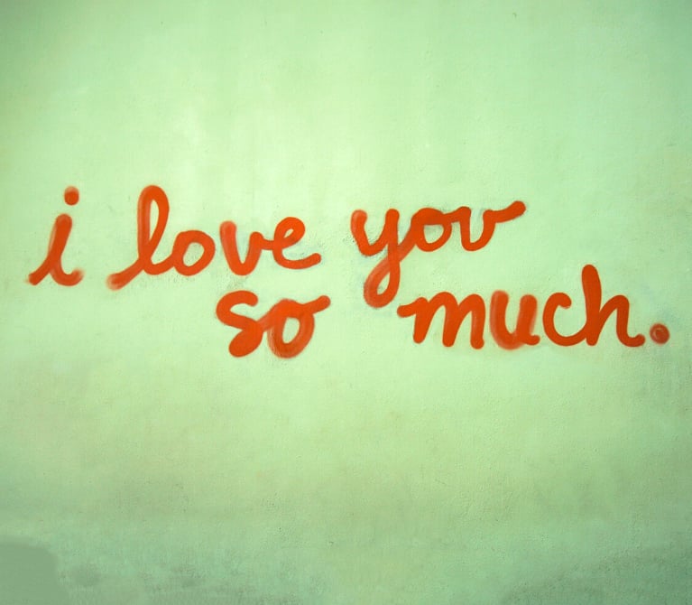 Spray painted words I Love You So Much mural at Jo's Coffee in Austin, Texas