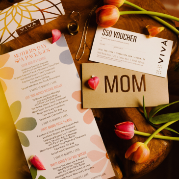 Viva Day Spa gift certificate next to a Mother's Day envelope that says 