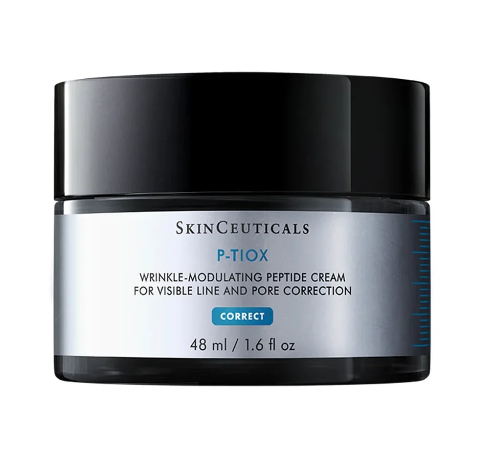 SkinCeuticals P-TIOX Wrinkle-Modulating Peptide Cream for Visible Line and Pore Correction, 48ml / 1.6 fl oz, in a black jar with silver label. Available at Viva Day Spa + Med Spa.