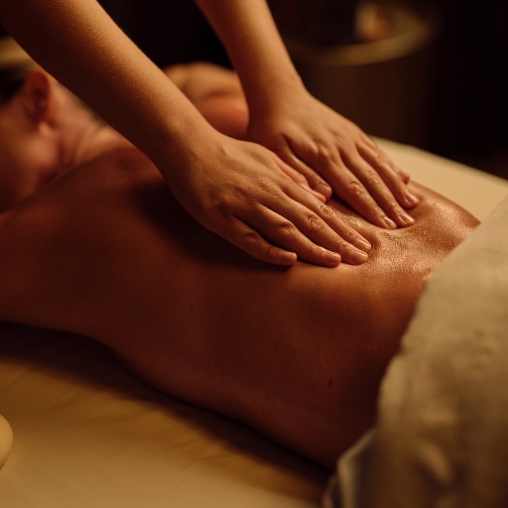 Woman receiving a massage at Viva Day Spa + Med Spa in Austin, Texas.